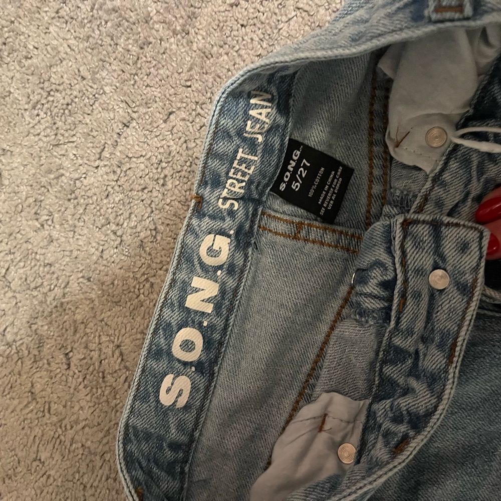 Light Wash Ripped Jeans - Picture 2 of 3